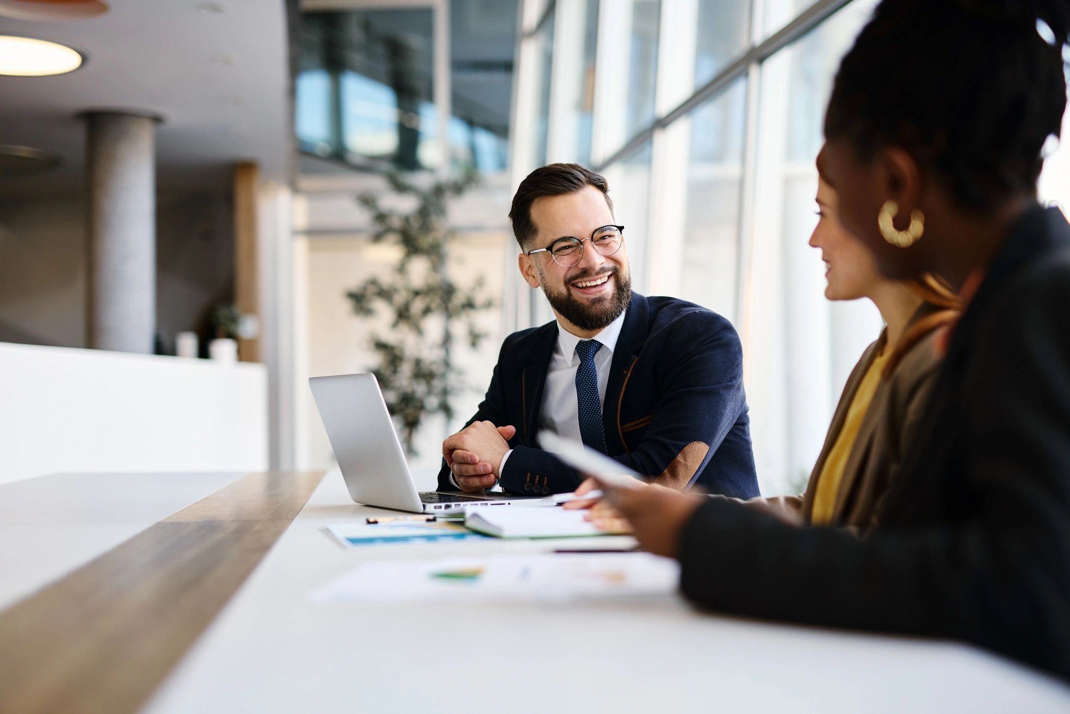 Business partners discussing strategy in a modern office