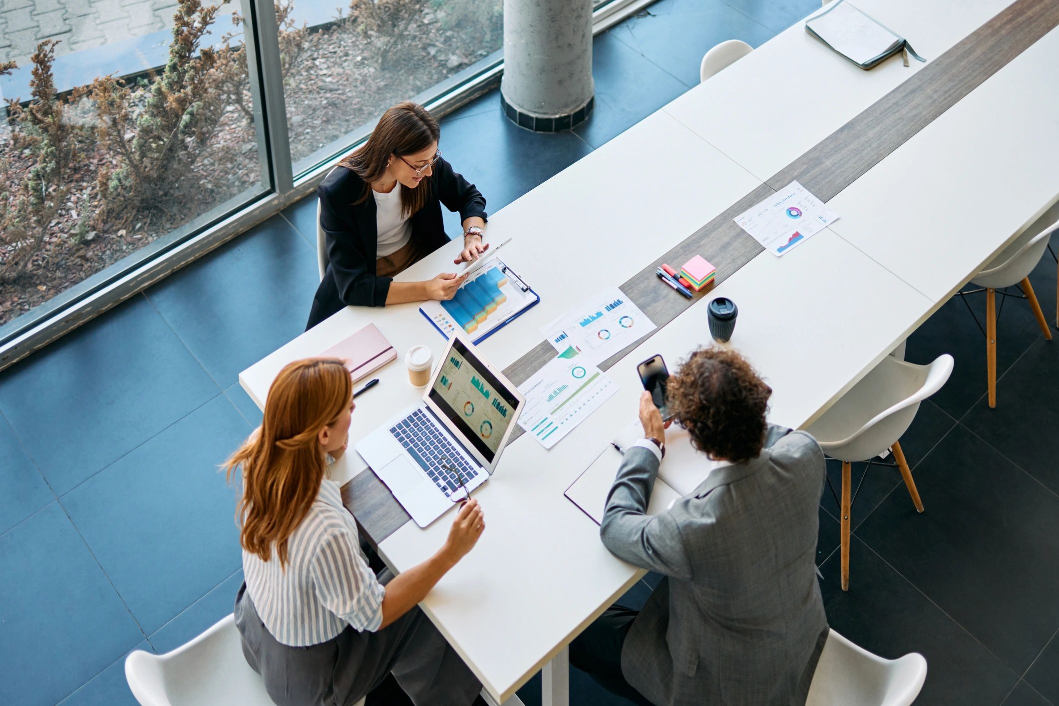 Business team analyzing data during office meeting